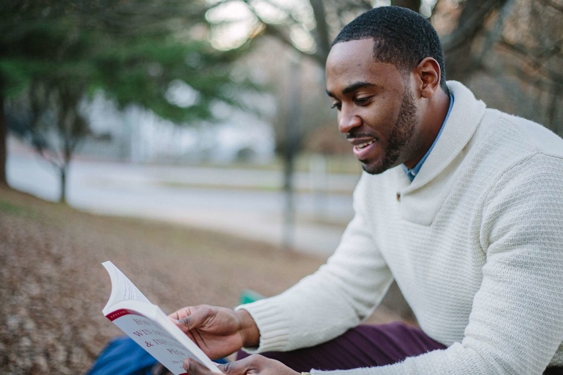 Man reading a book - Dope Uncle